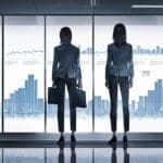 Oficinas modernas con pantallas que muestran gráficos de inteligencia artificial