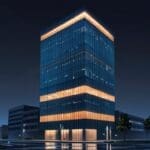 Edificio moderno y tecnológico iluminado, símbolo de innovación y ciencia.