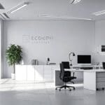 Interior moderno de oficina tecnológica con dispositivos de diseño minimalista sobre escritorios blancos, iluminación suave y ambiente corporativo innovador
