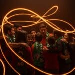 Campaña navideña de Atlético Nacional mostrando unión y familia a través del deporte y comunidades sólidas.