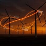 Parque eólico moderno en España con flujos de energía naranja representando ahorro eléctrico y sostenibilidad en el sector eólico startup.