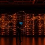 Centro de datos propio con 600 GPUs de comma.ai ilustrando la estrategia de infraestructura TI para startups frente al cloud.